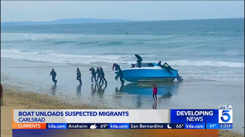 一艘船只在圣地亚哥卡尔斯巴的海滩冲上岸，并卸下了大约十几名疑似非法移民。 （KTL...