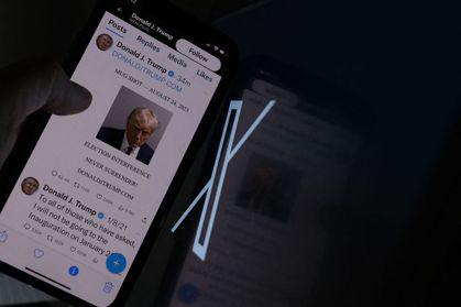 川普重新回到社媒X平台（前推特），貼出第一篇就是24日在喬州拍的監獄照。他在2021年1月被推特停權。(Getty Images)